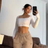 Pantalón Neighborhood chocolate, talla S — Cervo Sport, ropa deportiva de mujer
